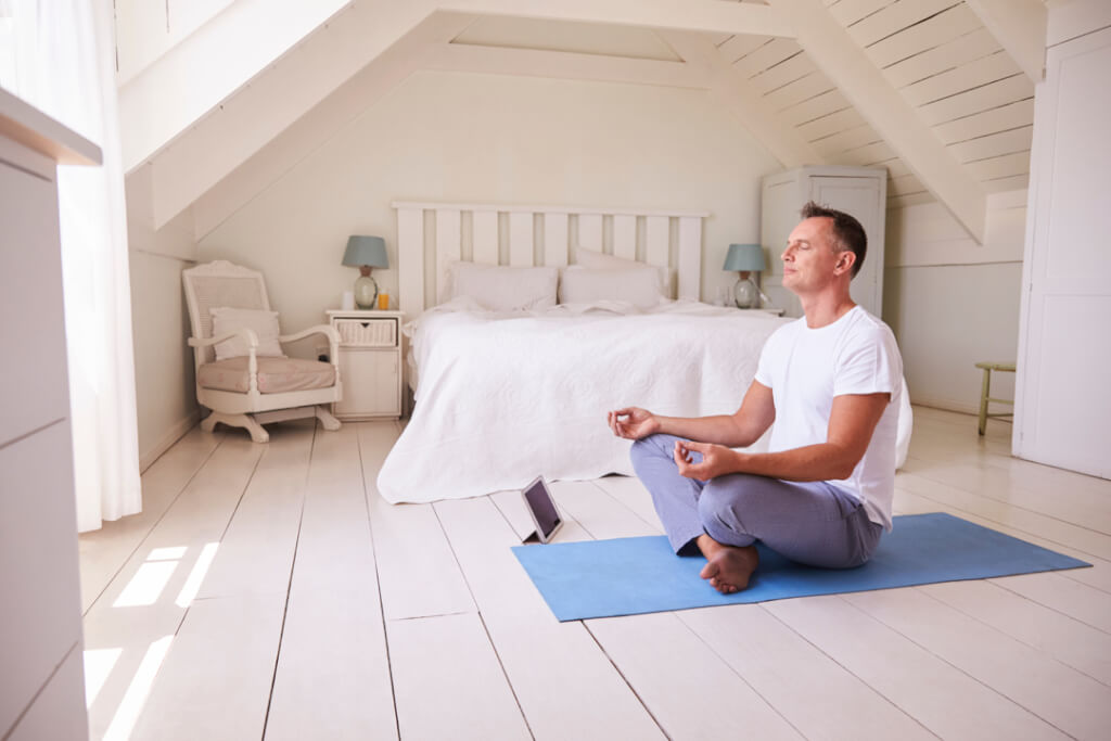 man meditating calm peace breathing