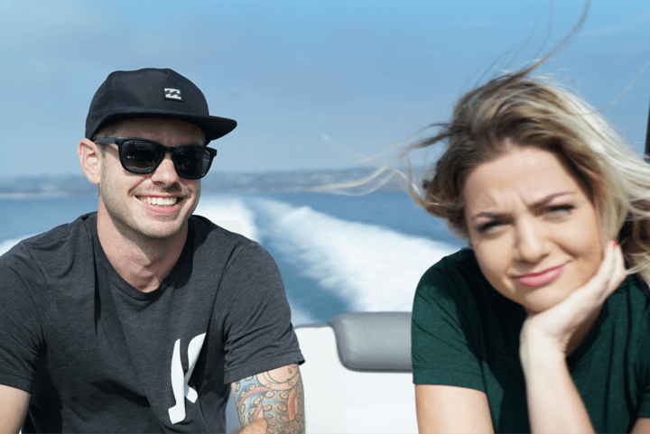 smiling_adults_blonde_woman_boat_speeding_drug_detox_san_diego smiling adults blonde woman boat speeding drug detox san diego