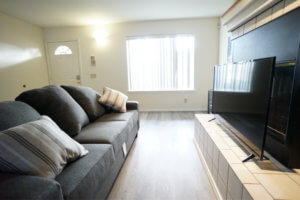 door_entrance_apartments_sofa_grey_rehab_pacific_beach door entrance apartments sofa grey rehab pacific beach