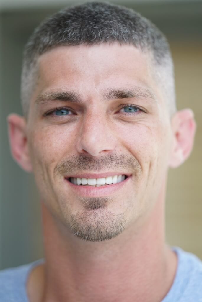 blue eyes man smiling rehabilitation program and detox