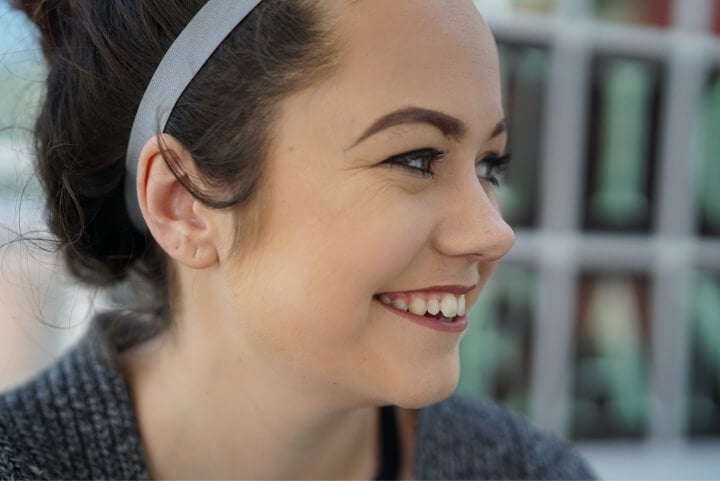 smile brown hair woman grey sweater addiction california treatment