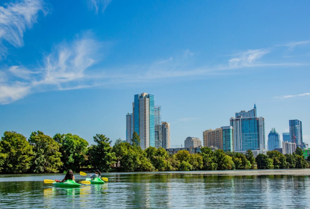 leave austin for rehabilitation kayakers on lady bird johnson lake in beautiful austin texas