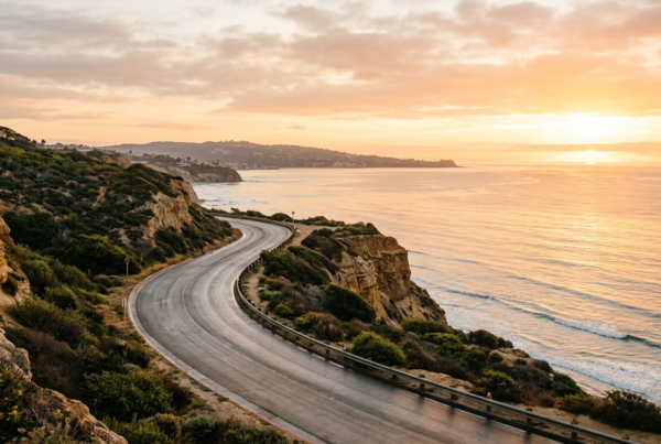 Sunrise over a winding La Jolla coastal road, symbolizing the Tim Allen recovery story of trauma, prison, and growth