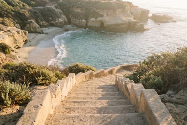 Gentle sandstone steps descending gradually to a calm La Jolla cove illustrating tapering off sedatives safely